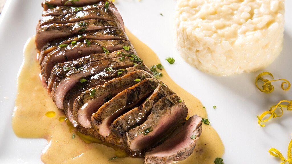 Ricetta del petto d'anatra al Lagrein su risotto alle noci