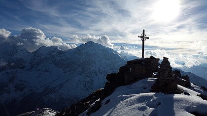 Dosso Bello peak in winter in Solda