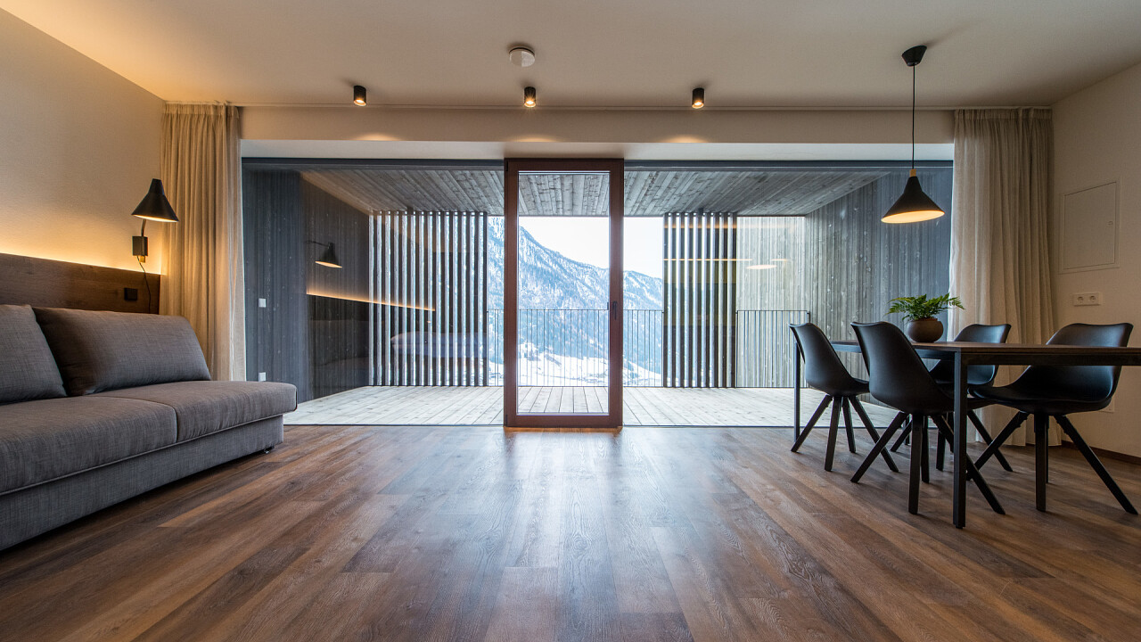 Soggiorno con divano Mountain Residence Montana