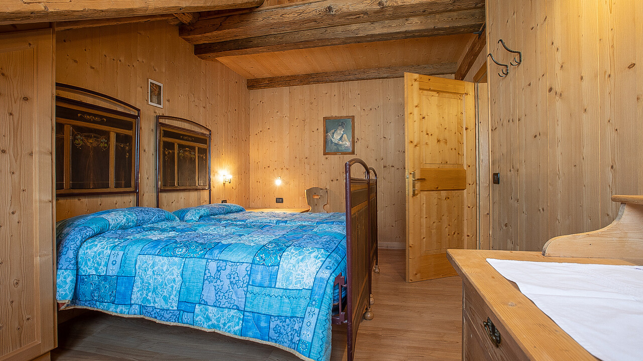 Camera da letto - Appartamento Raponzolo - Residenza Domino