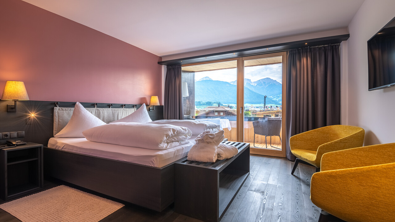 Letto matrimoniale - Camera Doppia Superior - Hotel Brunnerhof