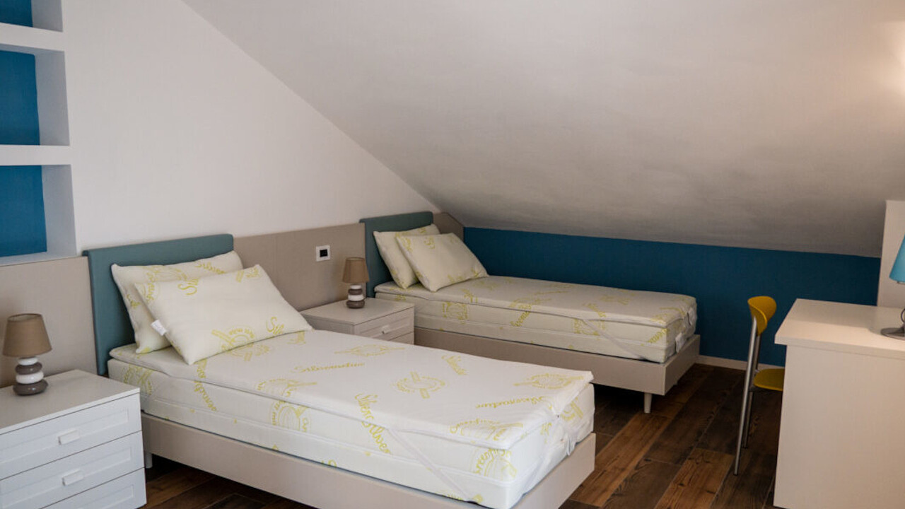 Interno camera Valmorel Martina House