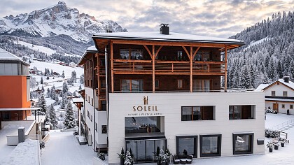 outdoor structure with a view of the Dolomites in winter Soleil - Alpine Lifestyle Hotel