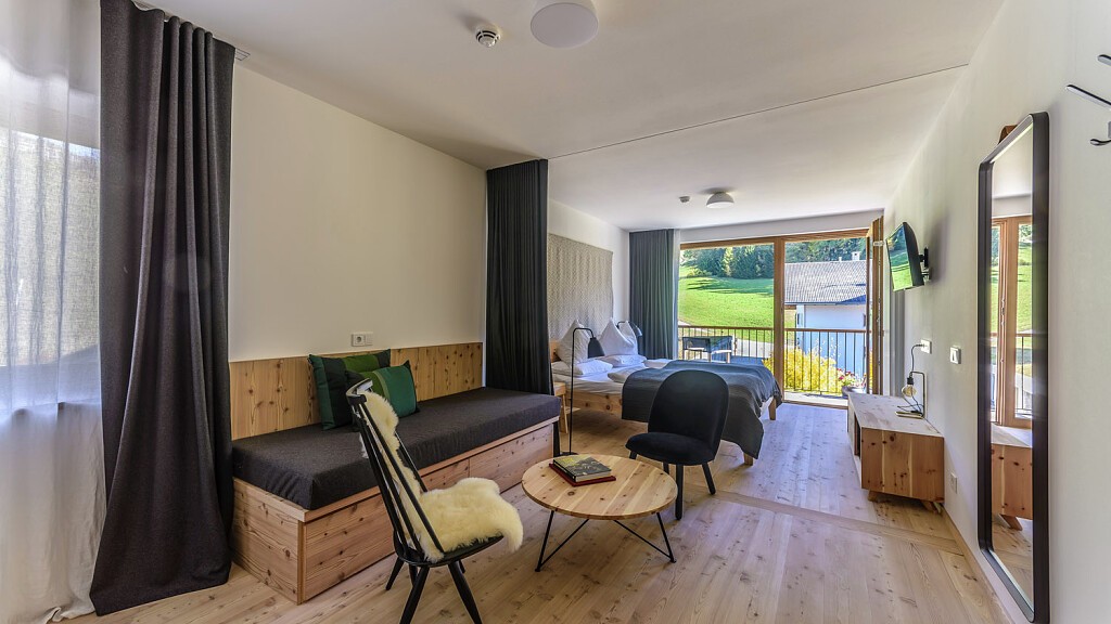 Junior Suite with balcony east with Dolomite view