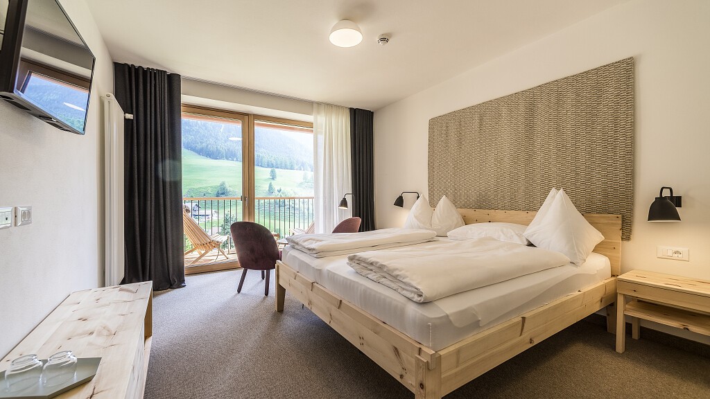 Double room south with loggia and Dolomite view