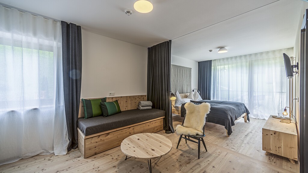 Junior Suite with balcony east with Dolomite view