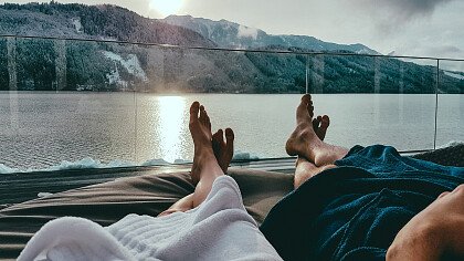 Couple relaxing in a luxury hotel with mountain view